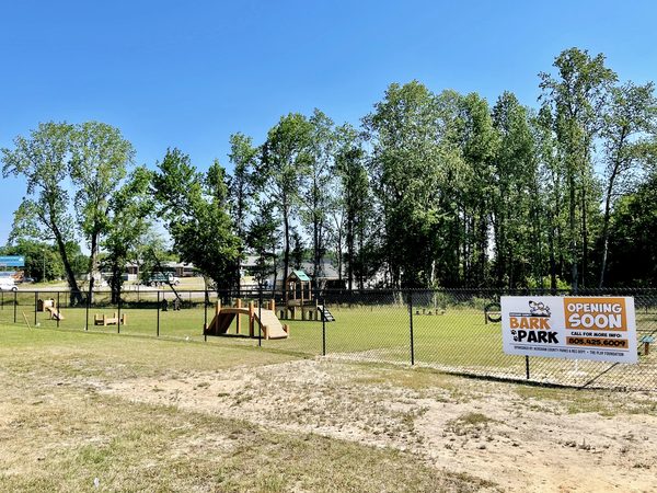 The fenced park with agility equipment and a Bark Park Opening Soon sign from Kershaw County Parks & Rec Dept and The PLAY Foundation