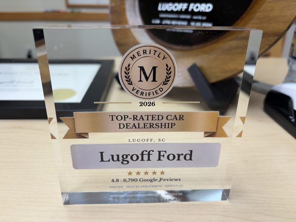 Clear acrylic desk award with the Meritly Verified seal, reading 2026, Top-Rated Car Dealership, Lugoff, SC, Lugoff Ford, five gold stars and 4.8 · 6,790 Google Reviews