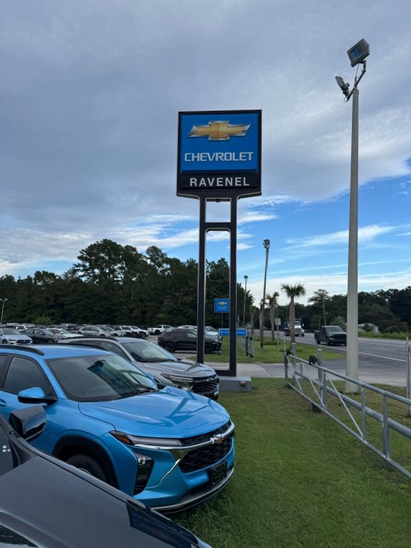 Tall Ravenel Chevrolet pylon sign with the Chevrolet bowtie and Ravenel lettering beside Savannah Highway